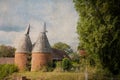 A farm in the countryside with an Oast House building used to dry hops. Herefordshire, UK Royalty Free Stock Photo