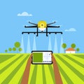 A hand remotely controlling a drone spraying fertiliser in the agricultural field Royalty Free Stock Photo