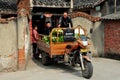 Jiu Chi Town, China: Family Loading Vegetables