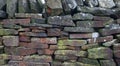 Farm fence made of stacked old flat stones