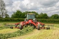 A farm fendt tractor with rota rake ready to make silage Royalty Free Stock Photo