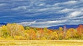 Farm Field And Fall Color With Threatening Dark Sky