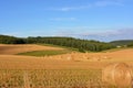 Farm fields with bales of hay