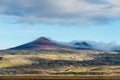 Farm by the foot of a volcano, in the vastness of Iceland Royalty Free Stock Photo