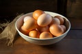 Farm Fresh Eggs in a bowl, displayed on a rustic wooden table Royalty Free Stock Photo