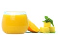 Farm fresh orange fruits with cool juice in a glass
