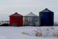 Farm grain bins in the winter. Royalty Free Stock Photo