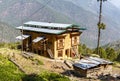 Farm house in the mountains in Bumthang, Eastern Bhutan Royalty Free Stock Photo