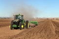 Farm implements planting wheat in the farm fields of Idaho. Royalty Free Stock Photo