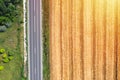 Farm land aerial view from above near country road, drone view ladnscape. Crops concept Royalty Free Stock Photo