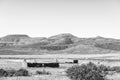 Farm landscape with ruins on road R364. Monochrome