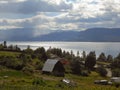 Farm living landscape with spectacular view on a lake. Royalty Free Stock Photo