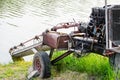 Farm machinery for pumping water to a soil land. Royalty Free Stock Photo