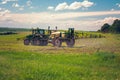 Farm machinery spraying insecticide to the agricultural field Royalty Free Stock Photo