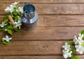 Farm milk. Lid for milk. On a wooden background. Natural healthy eating concept. Farm Food Items. Floral background. Place for Royalty Free Stock Photo