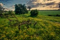 An old farm implement rusts in the field at a farm in South Africa