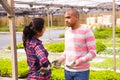 Farm owner gives instructions to the hired worker