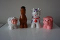 Farm plastic animals on white shelf Royalty Free Stock Photo