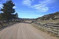 Farm road and blue sky Royalty Free Stock Photo