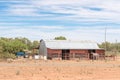 Farm scene with tractor, barn and horse