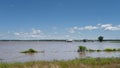 Farm buildings in standing water during spring flooding