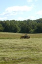 Farm Tractor Making Hay Royalty Free Stock Photo