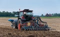 Farm tractor and seeder from the back