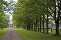 Farm with treelined dirt road in Ontario, Canada