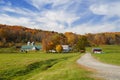 Farm in Vermont surrounded by fall color Royalty Free Stock Photo