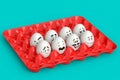 Farm white egg with expressions and funny face in plastic tray or cardboard Royalty Free Stock Photo