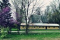 Farm with Yellow Outbuilding Royalty Free Stock Photo