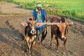 a farmar plugging in the agricultural farm in 90s style