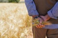 Farmer or agriculturist man holding some wheat ears Royalty Free Stock Photo