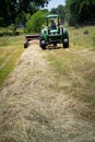 Farmer Bales Hay'