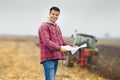 Farmer with bank forms Royalty Free Stock Photo