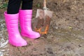 Farmer boots in the soil Royalty Free Stock Photo