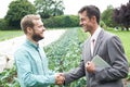 Farmer And Businessman Shaking Hands Royalty Free Stock Photo