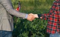 Farmer and businessman shaking hands Royalty Free Stock Photo