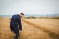 Farmer checking his crops Royalty Free Stock Photo