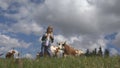 Farmer Child with Cattle on Meadow, Tourist Girl and Cows Animals in Mountains Royalty Free Stock Photo