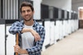 farmer cleaning modern stable