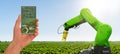 Farmer controls agricultural robot