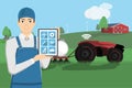 Farmer controls a autonomous tractor