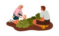 Farmer couple collecting vegetables, picking harvest, cabbages from garden bed. Family work at farm field, cultivating Royalty Free Stock Photo