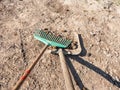 Farmer crearing big dung from a horse on ground Royalty Free Stock Photo