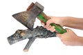 The farmer cuts with a rusty axe a log Royalty Free Stock Photo