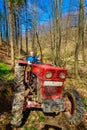 Farmer driving a old tractor Royalty Free Stock Photo