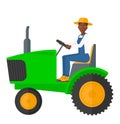 Farmer driving tractor