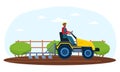 Farmer driving tractor and ploughing