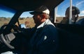 A farmer driving a truck in rural South Africa
